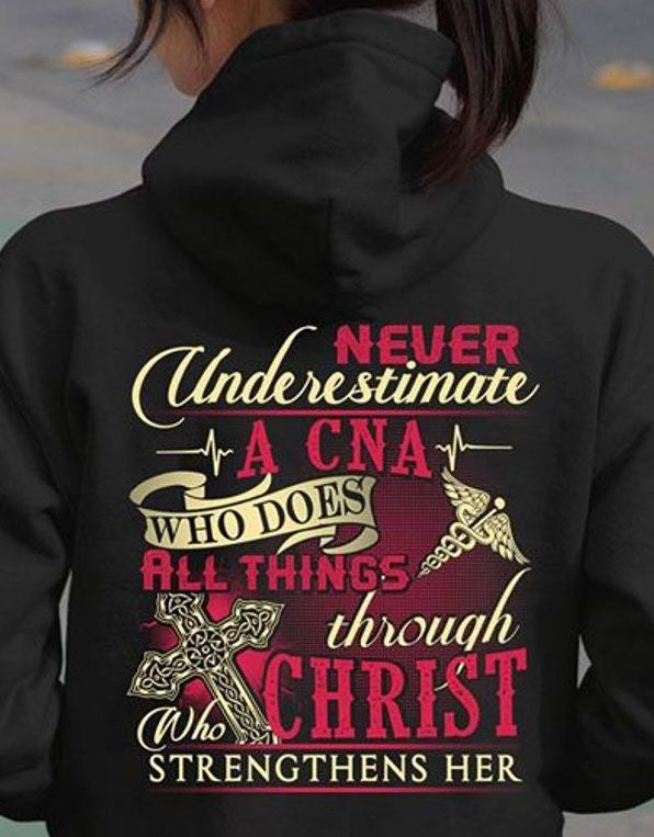 PresentsPrints, Nurse Never Underestimate A CNA Who Does All Things Through Christ Who Strengthens Her, Nurse T-Shirt